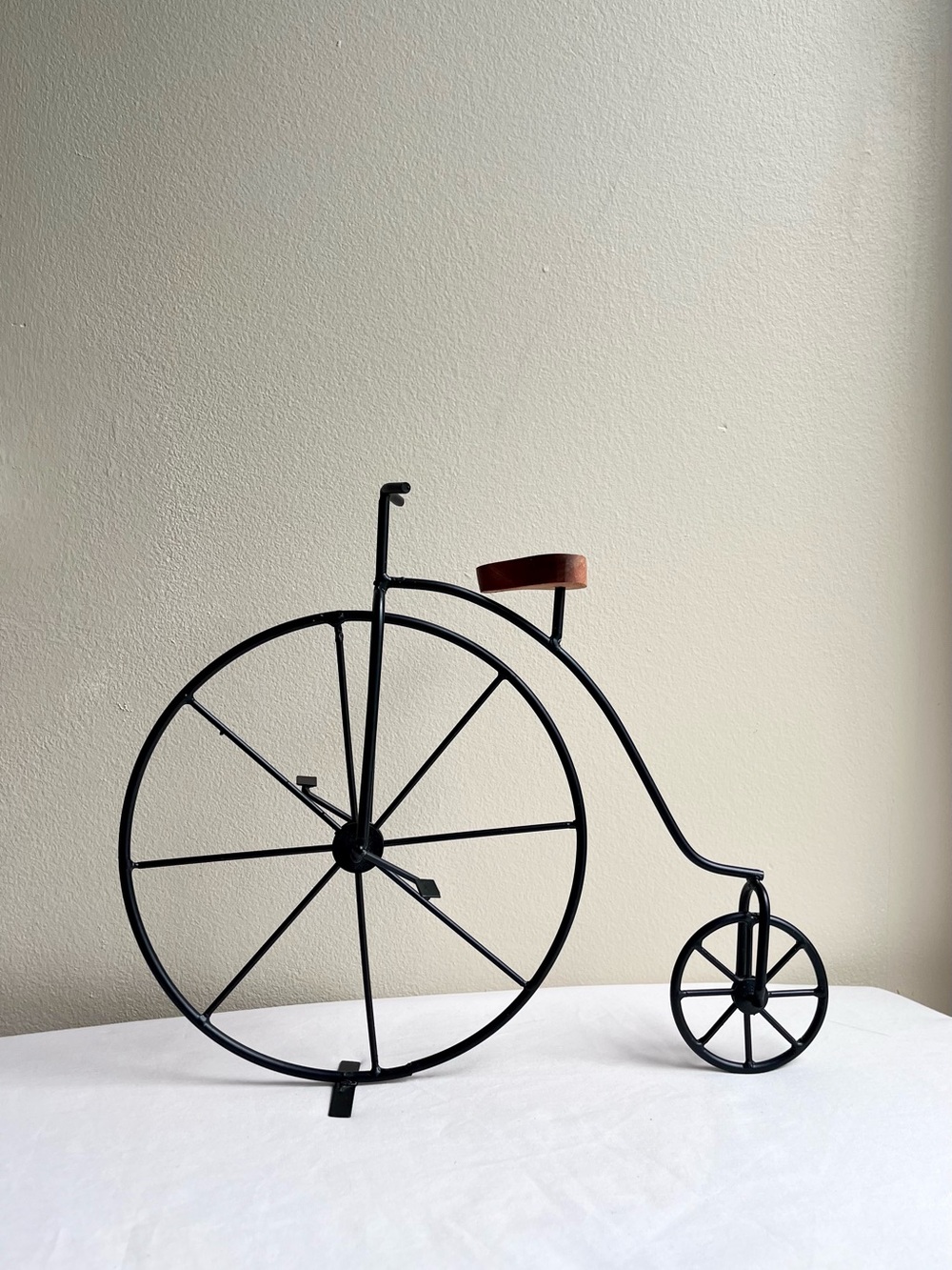 Decorative Black Metal Penny-Farthing Bicycle Sculpture with Brown Seat